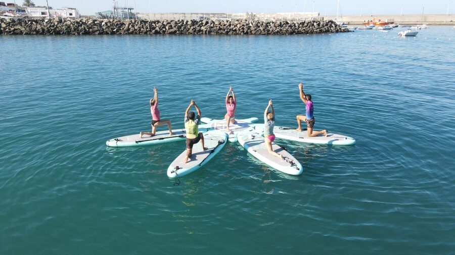 Arguineguín: Stand-up Paddleboard Yoga Class with Instructor - Included Gear and Comfort Tweaks You Can Request