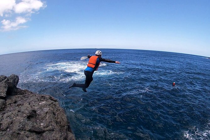 Coasteering Gran Canaria: The Atlantic Mountains Adventure Route - Abseiling down: harnessed, belayed, and taught as you go