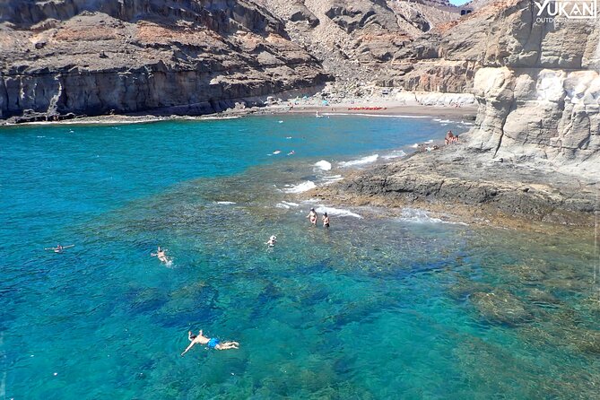 Kayak & Snorkeling Tour in Caves in Mogan - Entering volcanic caves by kayak, with optional ocean jumps
